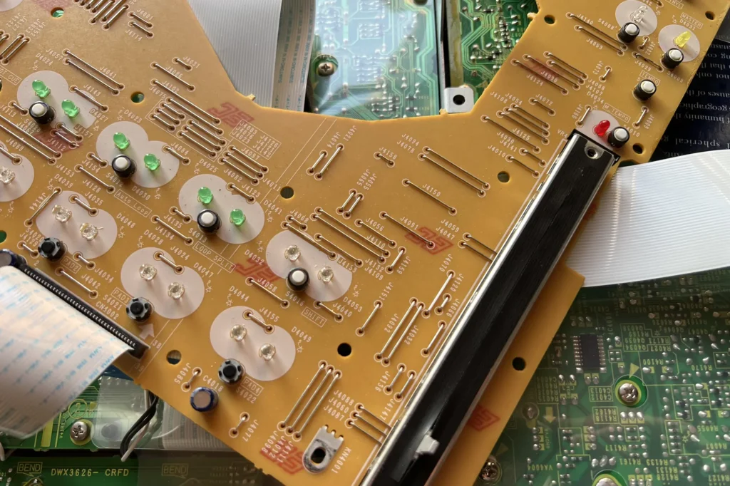 Photo of circuit boards removed from equipment being repaired